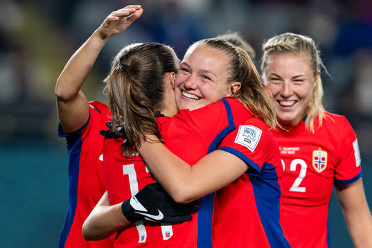 Guro Reiten and Frida Maanum of Norway celebrate after 4-0