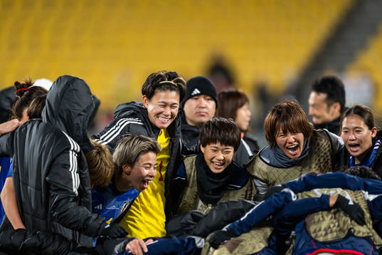 Mina Tanaka and goalkeeper Ayaka Yamashita of Japan