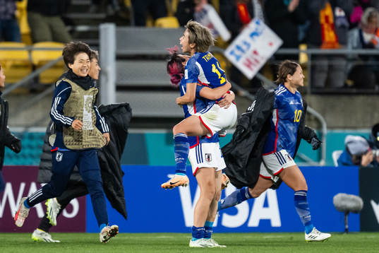Jun Endo and Mina Tanaka of Japan celebrate