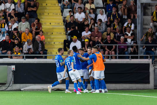 Arni Frederiksberg of Klaksvik celebrates with team mates