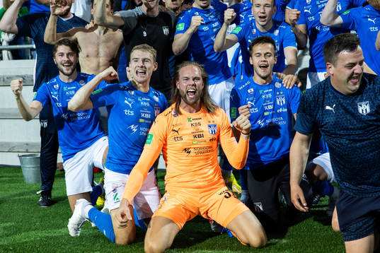 Goalkeeper Jonatan Johansson of Klaksvik celebrates with team mates