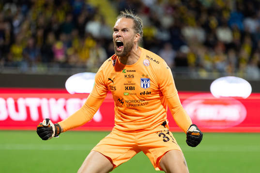 Goalkeeper Nils Jonatan Johansson of Klaksvik celebrates after saving a penalty shot