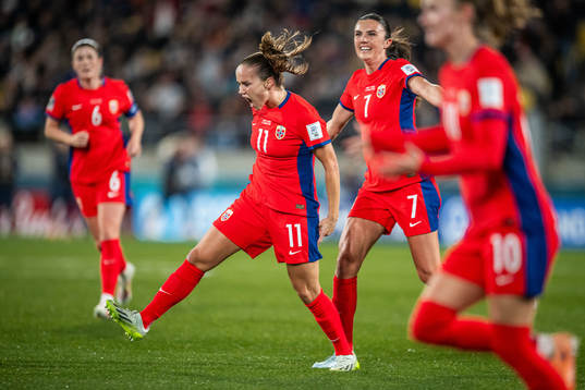 Guro Reiten and Ingrid Syrstad Engen of Norway celebrate after 1-1