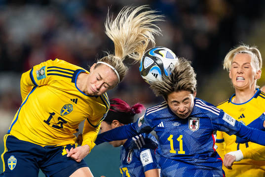 Amanda Ilestedt of Sweden and Mina Tanaka of Japan