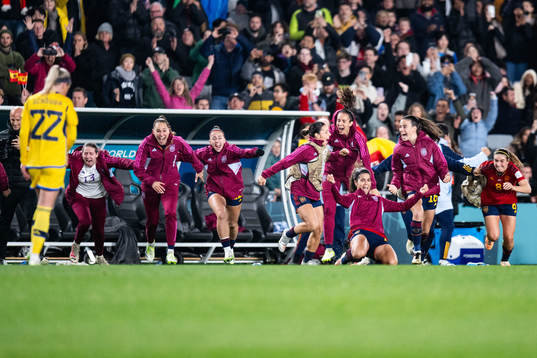 Players of Spain celebrate