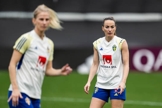 Sofia Jakobsson and Kosovare Asllani of the Swedish women's national football team at a training session