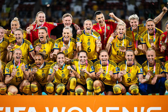 Players of Sweden celebrate with their bronze medals