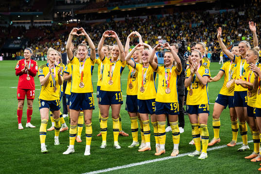Players of Sweden celebrate with their bronze medals