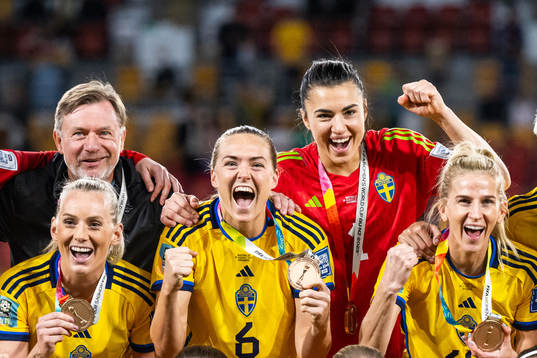 Head coach Peter Gerhardsson, Stina Blackstenius, Magdalena Eriksson, goalkeeper Zecira Musovic and Sofia Jakobsson of Sweden celebrate with their medals at the medal ceremony