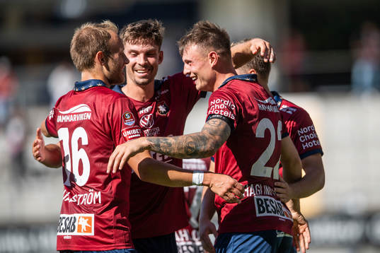 Örgrytes Villiam Dahlström, Daniel Paulson och Hampus Dahlqvist jublar tillsammans med målskytt Marcus Haglind Sangre 