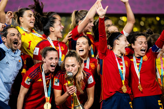 Players of Spain celebrate with the trophy