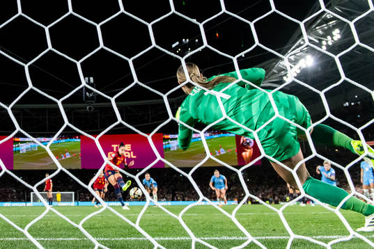Goalkeeper Mary Earps of England saves a penalty from