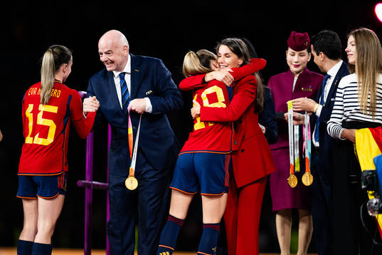 Eva Navarro of Spain receives the medal from FIFA president