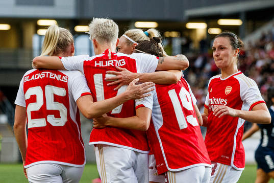 Arsenals Lina Hurtig is celebrated by her teammates after scoring 0-2
