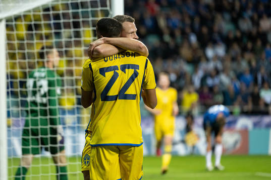 Robin Quaison and Viktor Claesson of Sweden celebrate after scoring 0-4