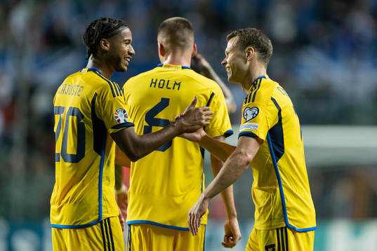 Jens Cajuste and Viktor Claesson of Sweden celebrate