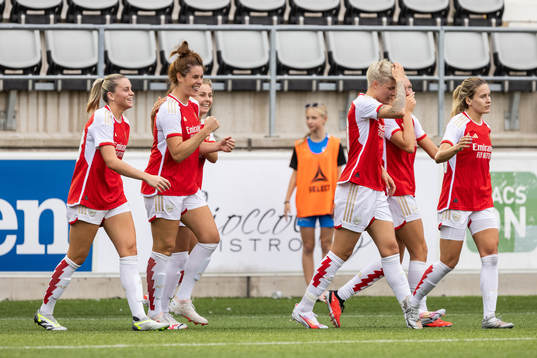 Jen Beattie of Arsenal celebrates after scoring 2-2