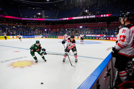 Wille Johansson of Färjestad and Lasse Bo Knudsen of Aalborg Pirates