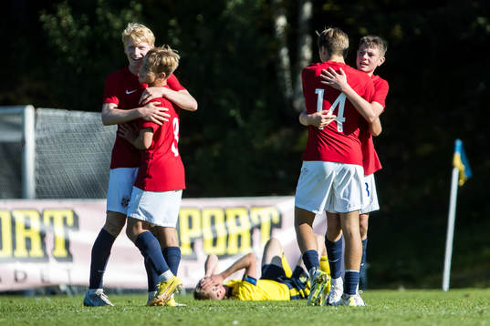 Norges spelarna jublar efter seger 0-1