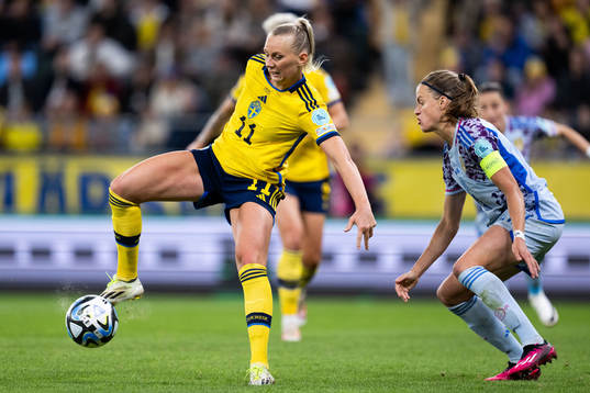 Stina Blackstenius of Sweden and Irene Paredes of Spain
