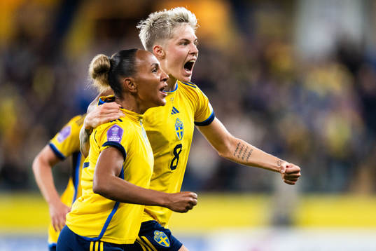 Lina Hurtig of Sweden celebrates with Madelen Janogy after 2-2