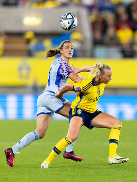 Irene Paredes of Spain and Stina Blackstenius of Sweden
