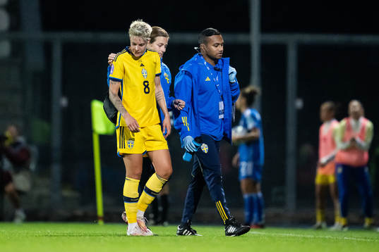 Lina Hurtig of Sweden with Physio Jenny Larsson and Medical