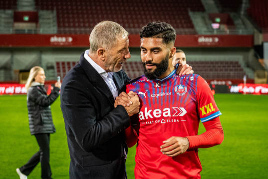 Helsingborgs tränare Stuart Baxter och Amin Al-Hamawi jublar