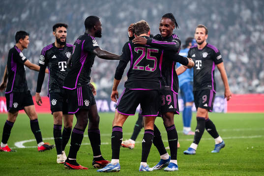 Thomas Muller and Mathys Tel of Bayern Munich celebrate after scoring 1-2