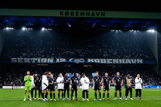 Players of Bayern Munich celebrate infront of their supporters