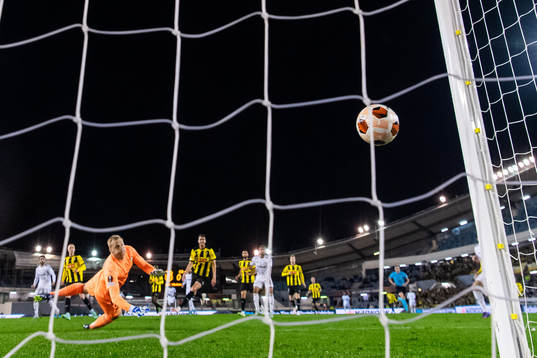 Juninho of Qarabag scores 0-1 behind goalkeeper Peter