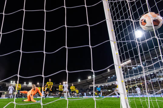 Juninho of Qarabag scores 0-1 behind goalkeeper Peter