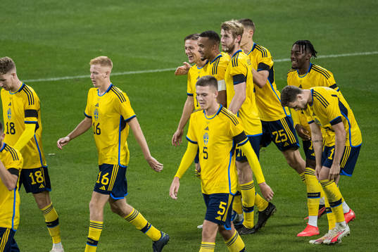 Jesper Karlsson and Robin Quaison of Sweden celebrating 3-1