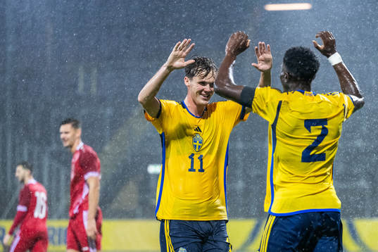 Williot Swedberg of Sweden celebrates with Josafat Mendes after 2-0