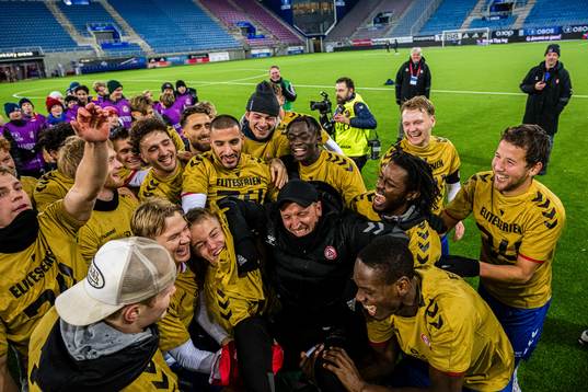Johannes Moesgaard, head coach of KFUM, celebrates