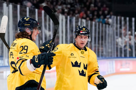 Mario Kempe and Olle Alsing of Sweden celebrate