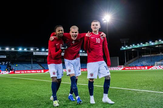 Joel Mugisha, Leo Fuhr Hjelde and Isak Hansen-Aarøen of Norway celebrates