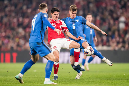 Christian Nørgaard of Denmark and Jaka Bijol of Slovenia