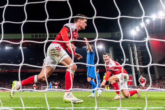 Joakim Mæhle of Denmark celebrates after scoring the 1-0 goal