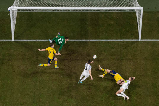 Artur Pikk and goalkeeper Karl Jakob Hein of Estonia against Viktor Claesson and Viktor Gyökeres of Sweden