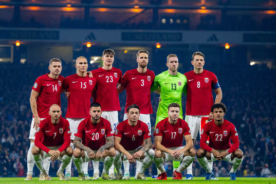 The starting eleven of Norway pose for a team photo