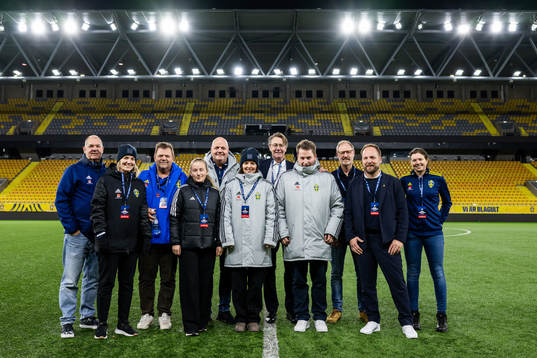 Event organizing staff pose for a picture