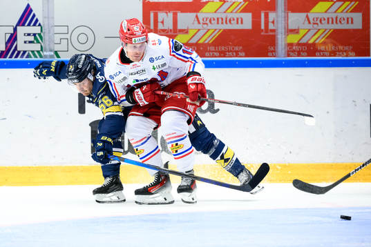 HV71s Fredrik Forsberg och Timrås Erik Andersson