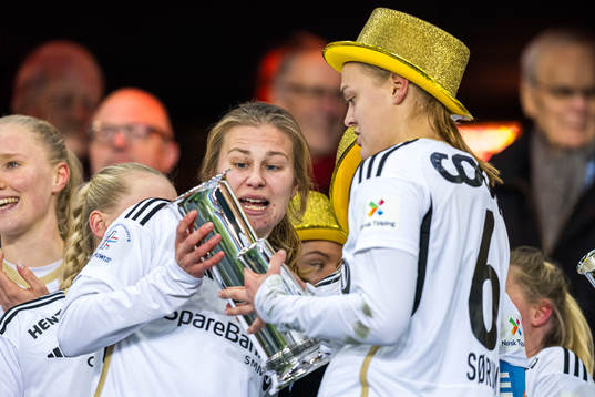 Cesilie Andreassen of Rosenborg celebrates with the trophy