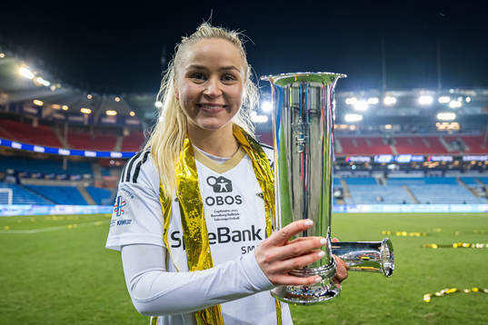 Anna Jøsendal of Rosenborg celebrates with the trophy