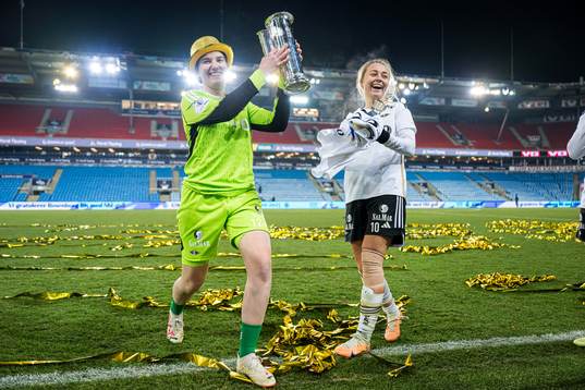 Lene Christensen and Camilla Linberg of Rosenborg celebrates with the trophy