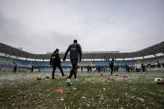Players enter the pitch