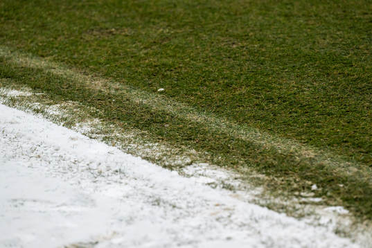 Snow next to the pitch at Ullevi stadium
