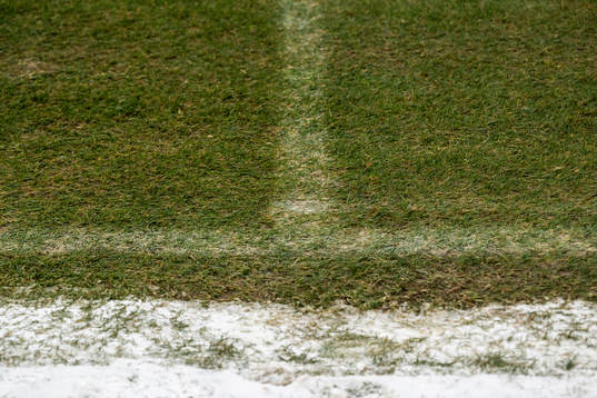Snow next to the pitch at Ullevi stadium