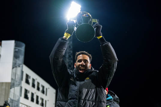 Amahl Pellegrino of Bodø/Glimt celebrates with the trophy